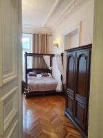Posteľ alebo postele v izbe v ubytovaní Prestige Aparthotel Piotrkowska 82 - wyjątkowy widok na deptak