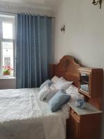 Posteľ alebo postele v izbe v ubytovaní Prestige Aparthotel Piotrkowska 82 - wyjątkowy widok na deptak