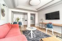 Telewizja i/lub zestaw kina domowego w obiekcie City Apartments - Apartamenty Butikowe