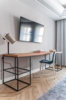 Telewizja i/lub zestaw kina domowego w obiekcie City Apartments - Apartamenty Butikowe