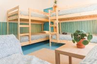 Postel nebo postele na pokoji v ubytování Hospedium Hostel República Surf House