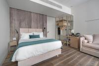 Postel nebo postele na pokoji v ubytování Hellenic Vibes Smart Hotel