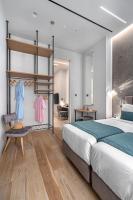 Postel nebo postele na pokoji v ubytování Hellenic Vibes Smart Hotel
