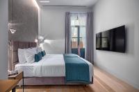 Postel nebo postele na pokoji v ubytování Hellenic Vibes Smart Hotel