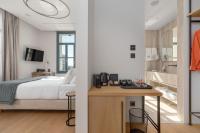 Postel nebo postele na pokoji v ubytování Hellenic Vibes Smart Hotel
