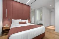 Postel nebo postele na pokoji v ubytování Hellenic Vibes Smart Hotel