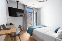 TV a/nebo společenská místnost v ubytování Hellenic Vibes Smart Hotel