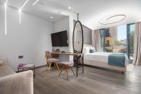 Postel nebo postele na pokoji v ubytování Hellenic Vibes Smart Hotel