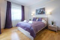 Posteľ alebo postele v izbe v ubytovaní Zakopane Apartamenty LUX