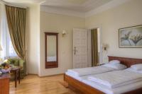 Łóżko lub łóżka w pokoju w obiekcie Seehotel Billroth