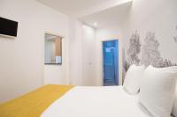 Postel nebo postele na pokoji v ubytování Paris La Concha - IB Apartments