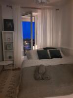 Łóżko lub łóżka w pokoju w obiekcie AnJa Apartment