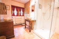a bathroom with a shower and a sink at Beautiful renovated chalet near ski resort France in Arâches-la-Frasse
