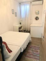 Posteľ alebo postele v izbe v ubytovaní Apartments & Rooms Formenti