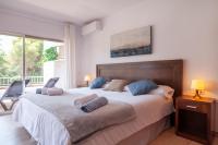 Postel nebo postele na pokoji v ubytování Jardines del Mar Apartments