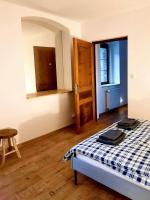 Posteľ alebo postele v izbe v ubytovaní Casa Santini