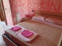 Posteľ alebo postele v izbe v ubytovaní Tivoli Medieval House