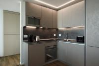 Kuchnia lub aneks kuchenny w obiekcie Torre Galfa Milano Luxury Apartments | UNA Esperienze