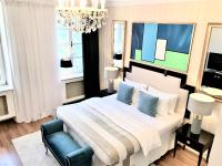 Posteľ alebo postele v izbe v ubytovaní MONDRIAN Luxury Suites & Apartments Market Square I