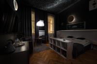 Posteľ alebo postele v izbe v ubytovaní apartamenty kamienica
