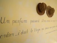 a piece of paper with a writing on a wall at The Originals Boutique, Hôtel du Parc, Cavaillon (Inter-Hotel) in Cavaillon