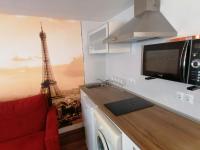 Kuchyň nebo kuchyňský kout v ubytování Studio Little Paris