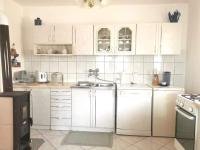 Kuchyňa alebo kuchynka v ubytovaní APARTMAN PAVELIĆ