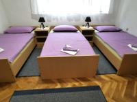 Posteľ alebo postele v izbe v ubytovaní APARTMAN PAVELIĆ