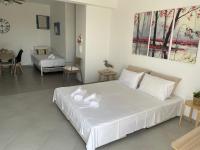 Postel nebo postele na pokoji v ubytování Isidoros Apartments