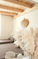 A bed or beds in a room at B&B Oplonti Resort