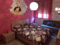 Posteľ alebo postele v izbe v ubytovaní FLY HOUSE BOLOGNA...un appartamento al volo