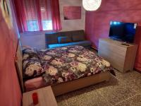 Posteľ alebo postele v izbe v ubytovaní FLY HOUSE BOLOGNA...un appartamento al volo