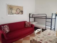 A bed or beds in a room at B&B Lo Scrigno del Salento