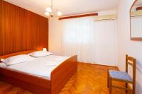 Posteľ alebo postele v izbe v ubytovaní Apartmani Vranjes