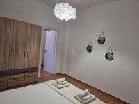 Postel nebo postele na pokoji v ubytování PINE TREE apartment
