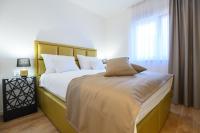 Postel nebo postele na pokoji v ubytování Luxury Apartments Leonika