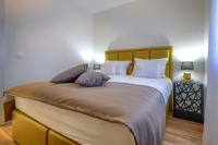 Postel nebo postele na pokoji v ubytování Luxury Apartments Leonika