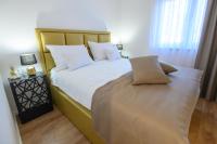Postel nebo postele na pokoji v ubytování Luxury Apartments Leonika