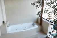 A bathroom at Mosaics Astonishing Acropolis view Aprtm