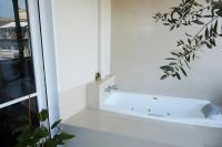 A bathroom at Mosaics Astonishing Acropolis view Aprtm