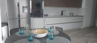 Kuchyňa alebo kuchynka v ubytovaní Osiedle Bursztynowe III by Jantar Apartamenty Kołobrzeg