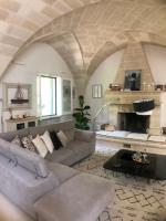 A seating area at MASSERIA INCANTAMENTO Suite Bouganville