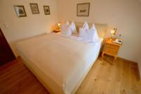 A bed or beds in a room at Hotel See-Villa