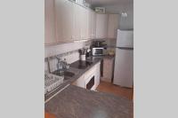 Kuchyň nebo kuchyňský kout v ubytování "EL RINCON" naturist boutique apartment