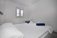 Postel nebo postele na pokoji v ubytování Apartments BlueView