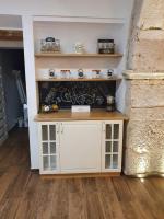 A kitchen or kitchenette at ARTEMIDE "Arco Antico" B&B SUITE SPA