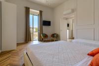 A bed or beds in a room at agropoli luxury home
