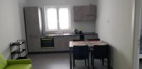 Kuchyňa alebo kuchynka v ubytovaní Casa MIMI Aparthotel