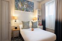 Postel nebo postele na pokoji v ubytování Sloane Square Hotel