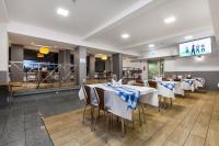 Reštaurácia alebo iné gastronomické zariadenie v ubytovaní Hotel Olivia
